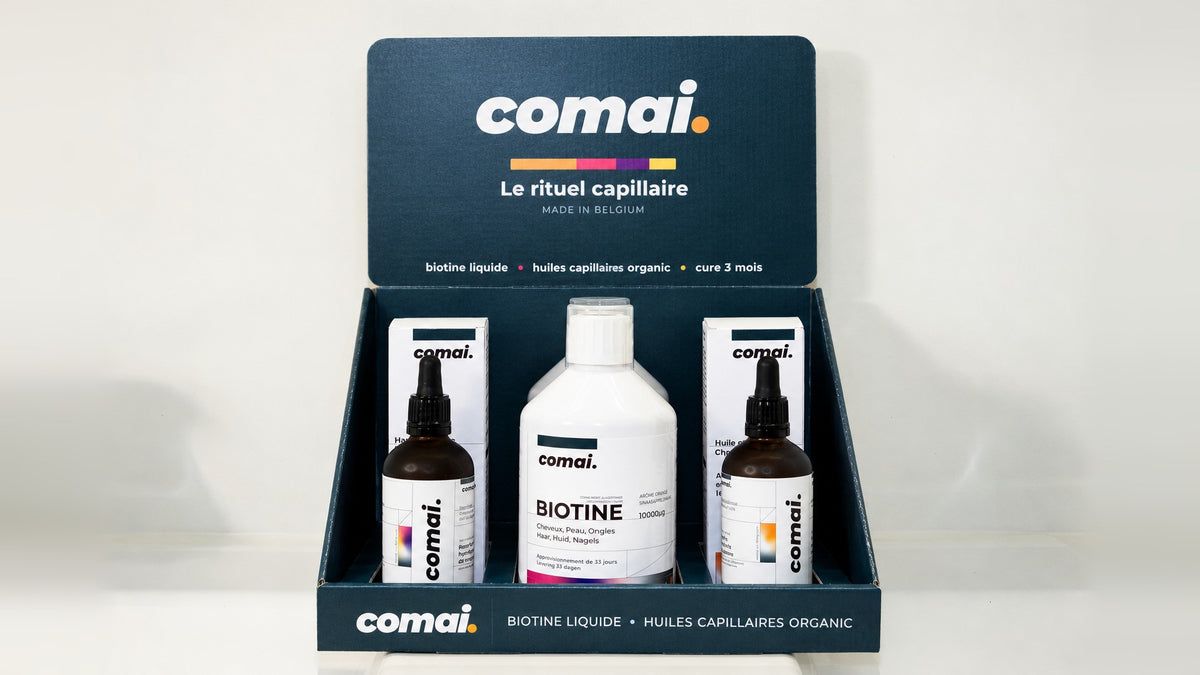 Le présentoir comai. en officine : biotine liquide et huiles capillaires