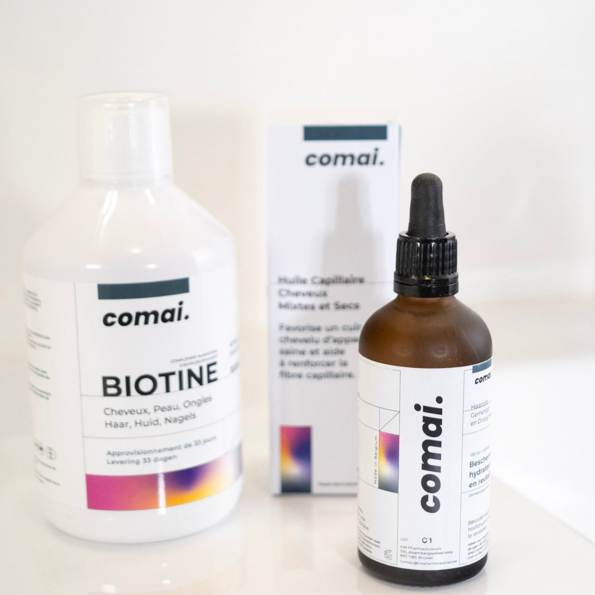 Système COMAI : flacon de biotine liquide 500 ml avec l'huile capillaire Cheveux Mixtes et Secs et son étui